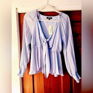 Adorable front tie blouse from Franceska’s